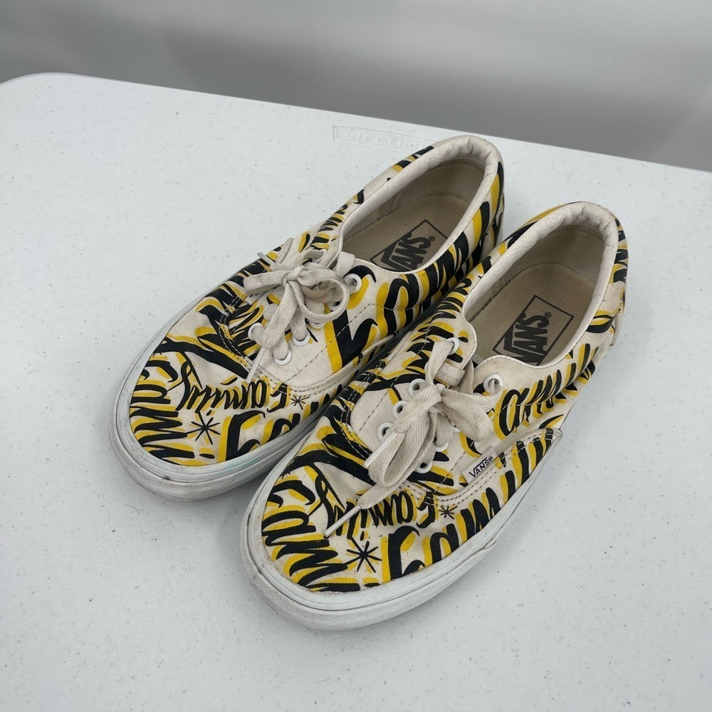Vans Family Era Exclusive black gold text sneakers